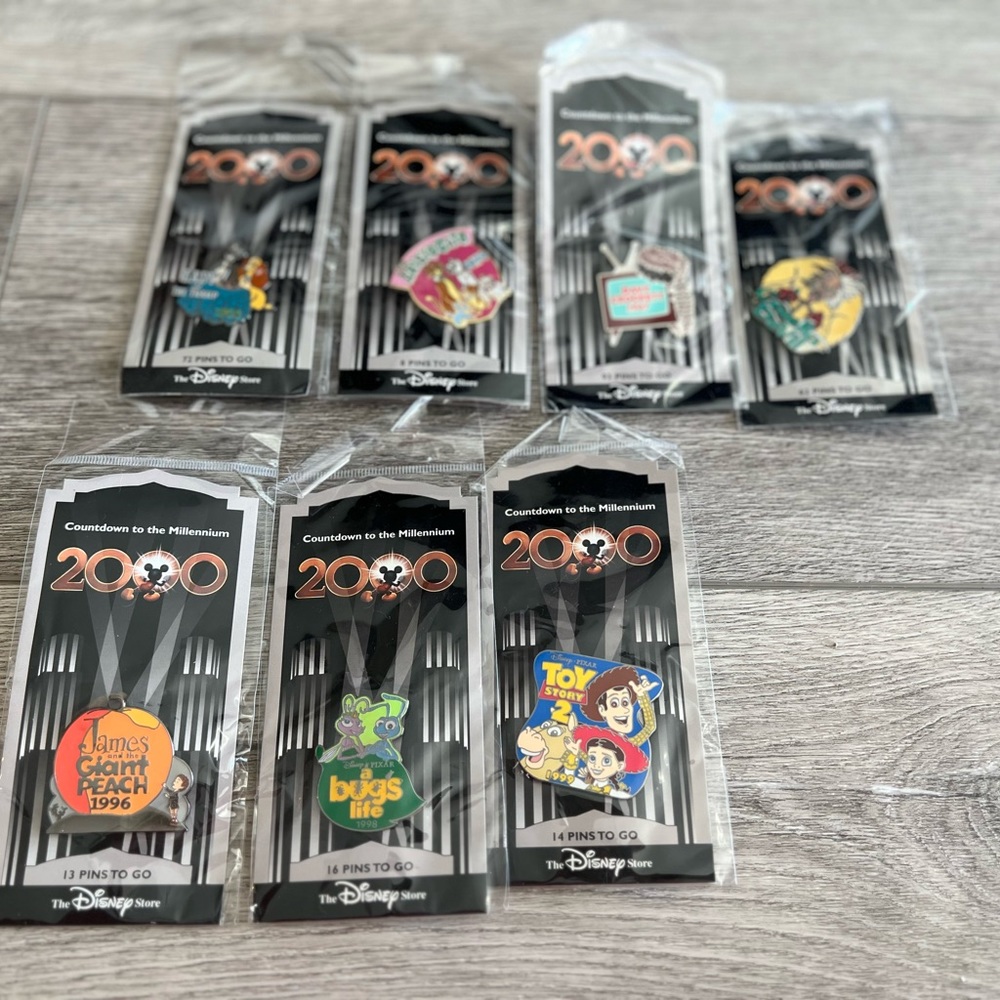 7 unopened 2000 countdown to the millennium pins, with wrong date Davy Crockett